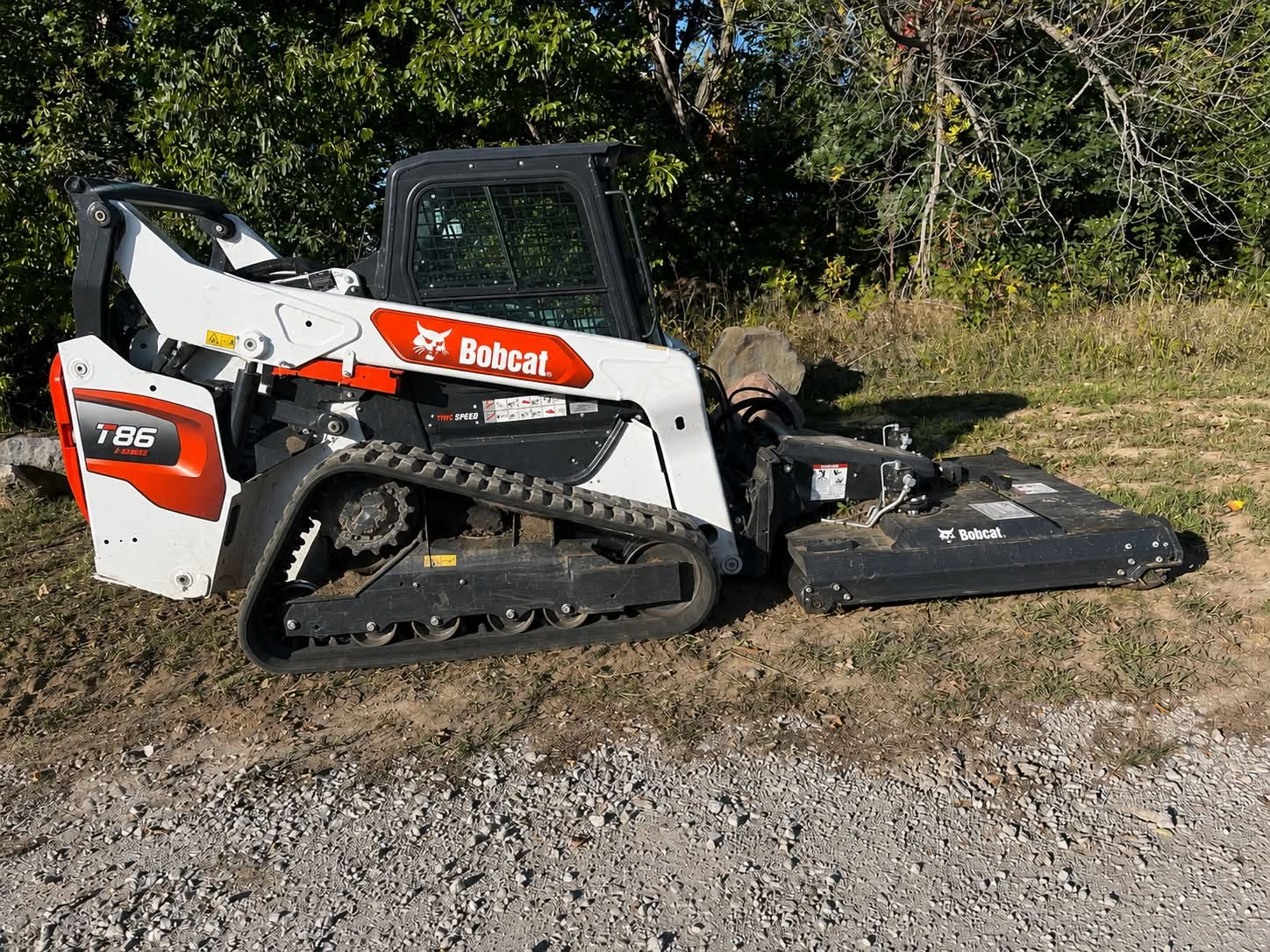 Forestry mulching equipment clearing overgrown land in Richmond, Missouri